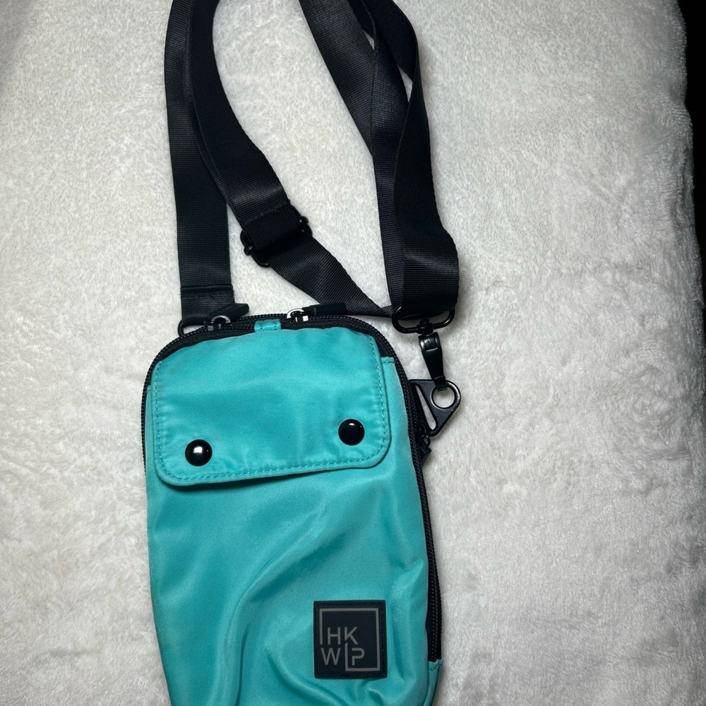 Compact Blue and Black Crossbody Bag with Water-Resistant Fabric